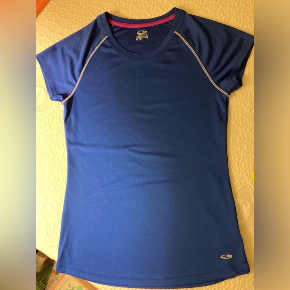 Champion Semi-Fitted Medium Tee. Will fit Small or Medium